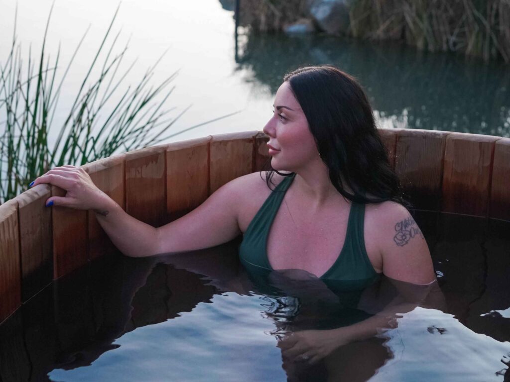 A woman enjoying a pool at the Murrieta Hot Springs Resort